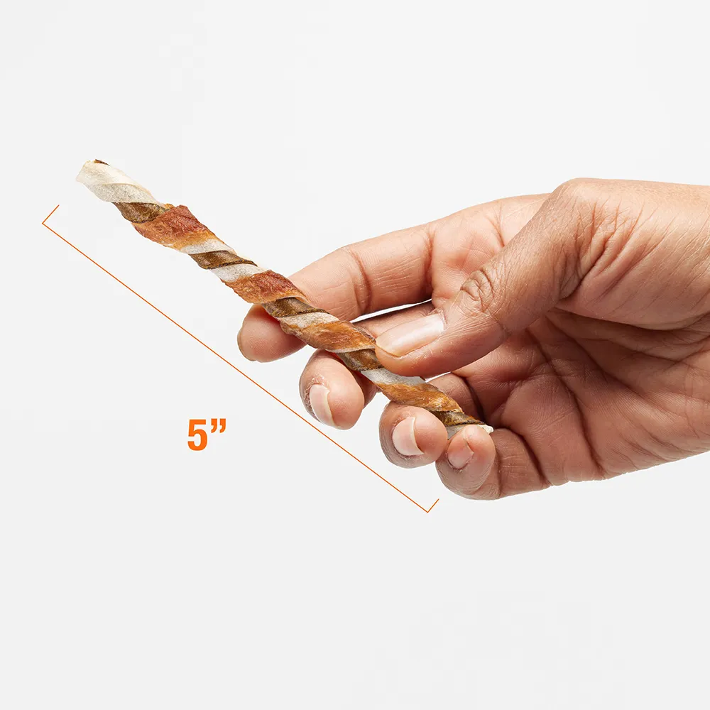 Hand holding a treat showing 5 inches in length