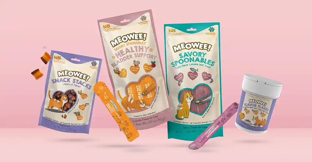 Meowee Cat Treats floating in front of a pink background
